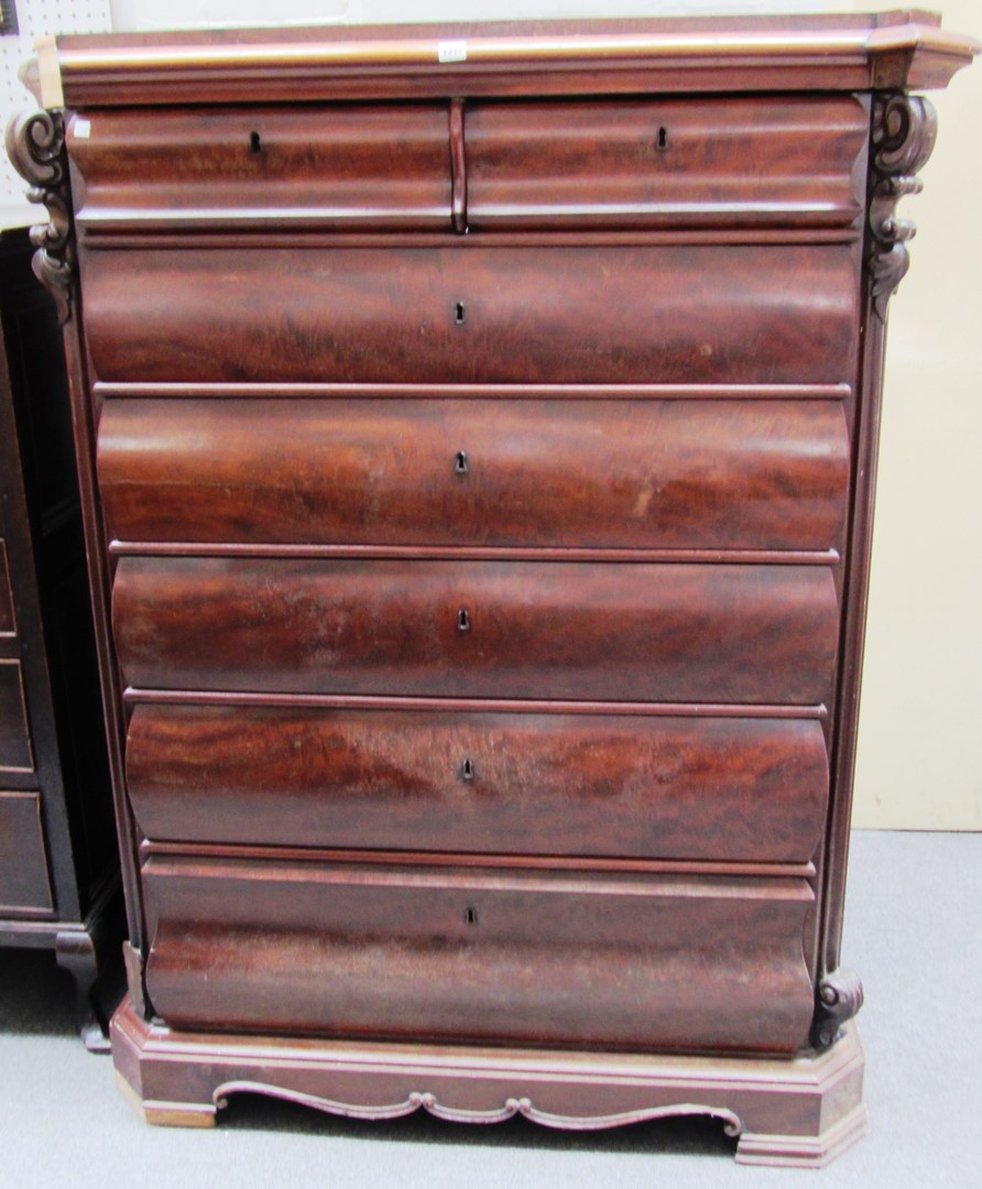 Appraisal: A th century continental mahogany tall chest of two short