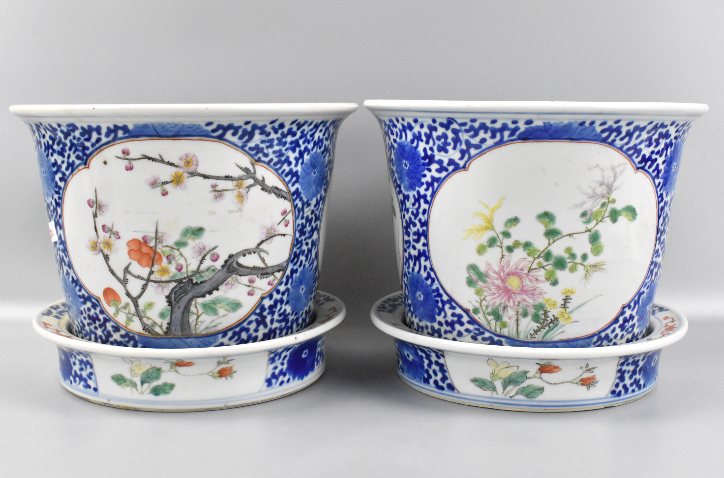 Appraisal: A pair of Chinese famille rose planters with trays dating