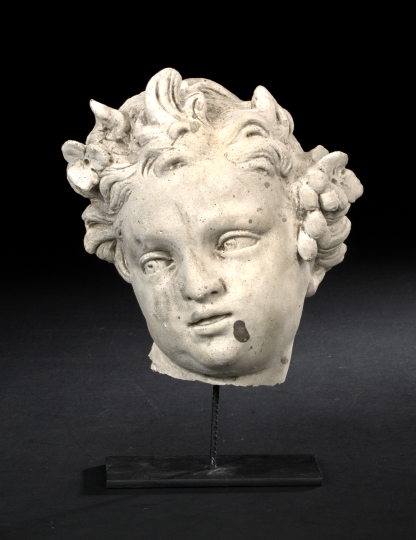 Appraisal: French Antique-White Cast Plaster Head of a Putto in the