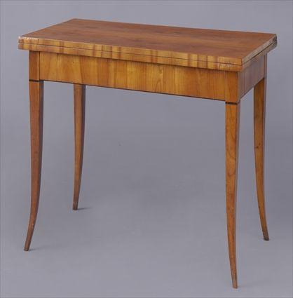 Appraisal: SOUTH GERMAN BIEDERMEIER GAMES TABLE The rectangular folding and swivel