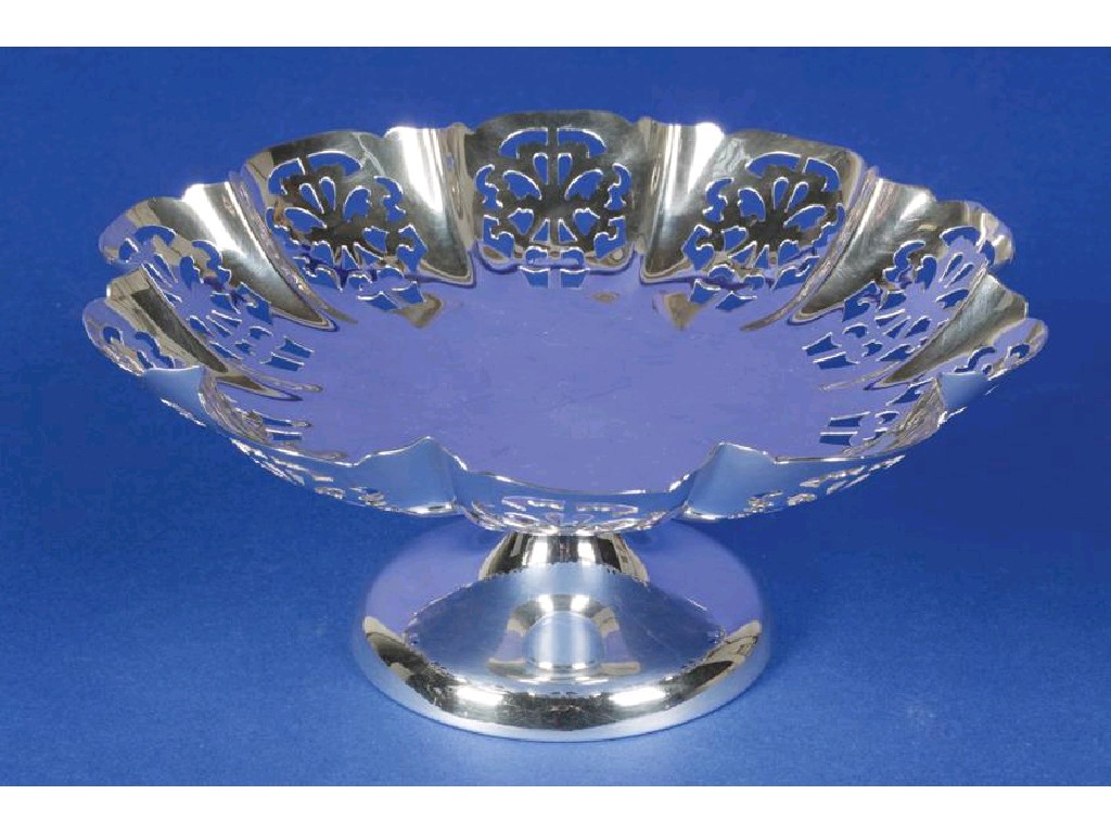 Appraisal: A PEDESTAL DISH of shaped circular form with geometric pierced