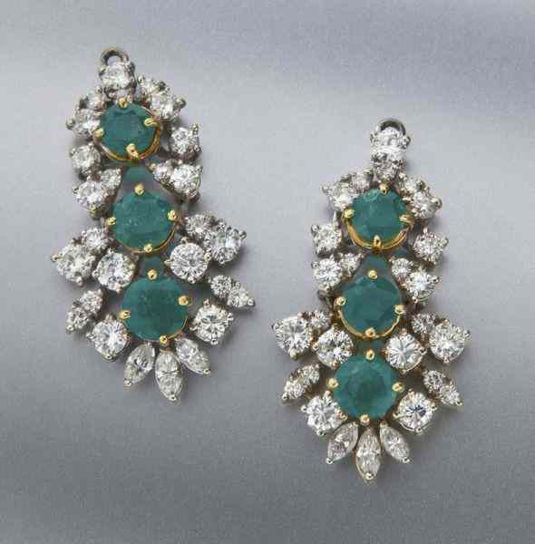 Appraisal: Pr K gold diamond and emerald earring jacketsfeaturing six natural