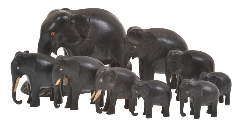 Appraisal: GROUP OF NINE EBONY ELEPHANTS GRADUATING IN SIZE