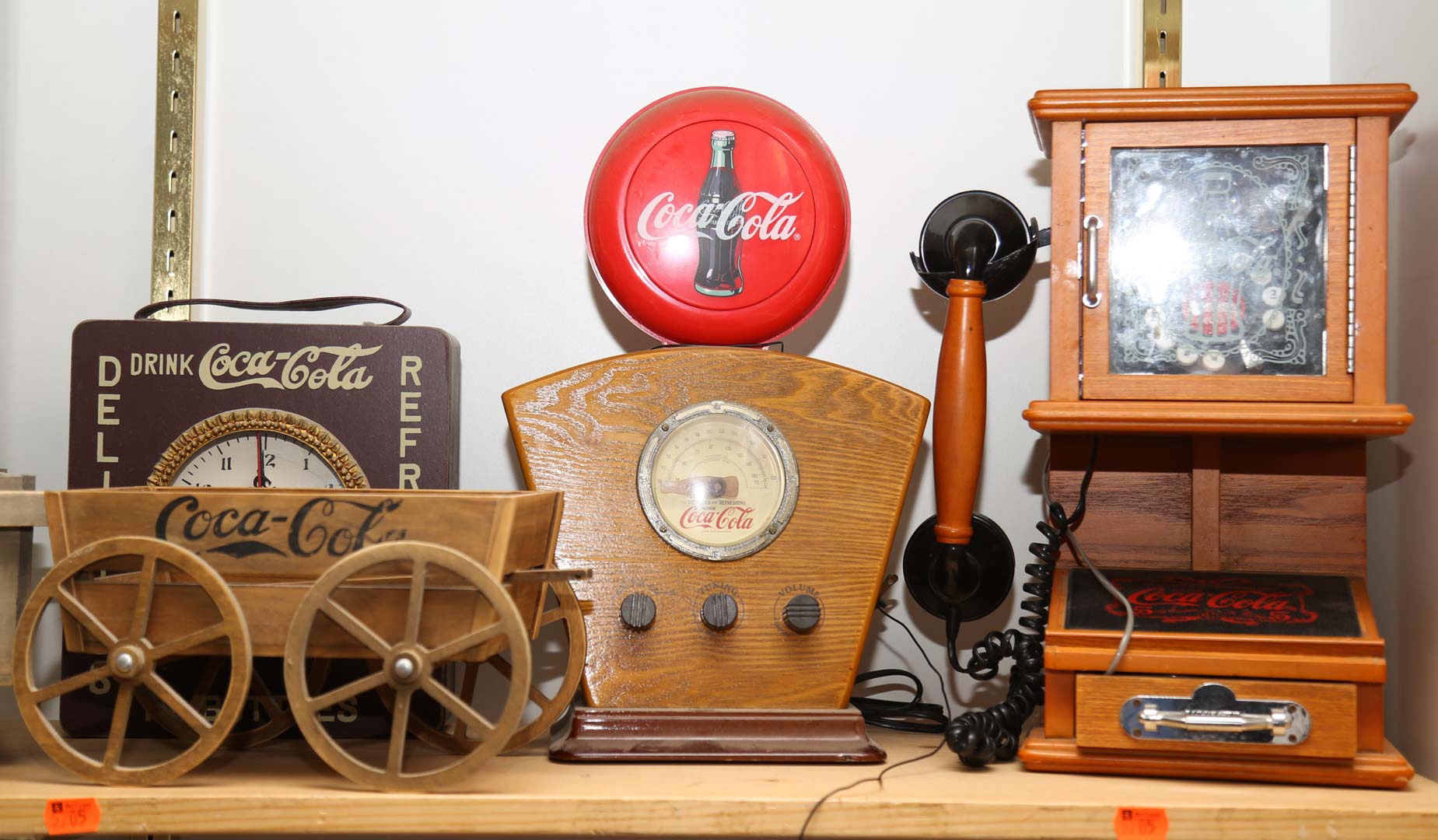 Appraisal: Shelf lot of Coca-Cola collectibles Undernumber