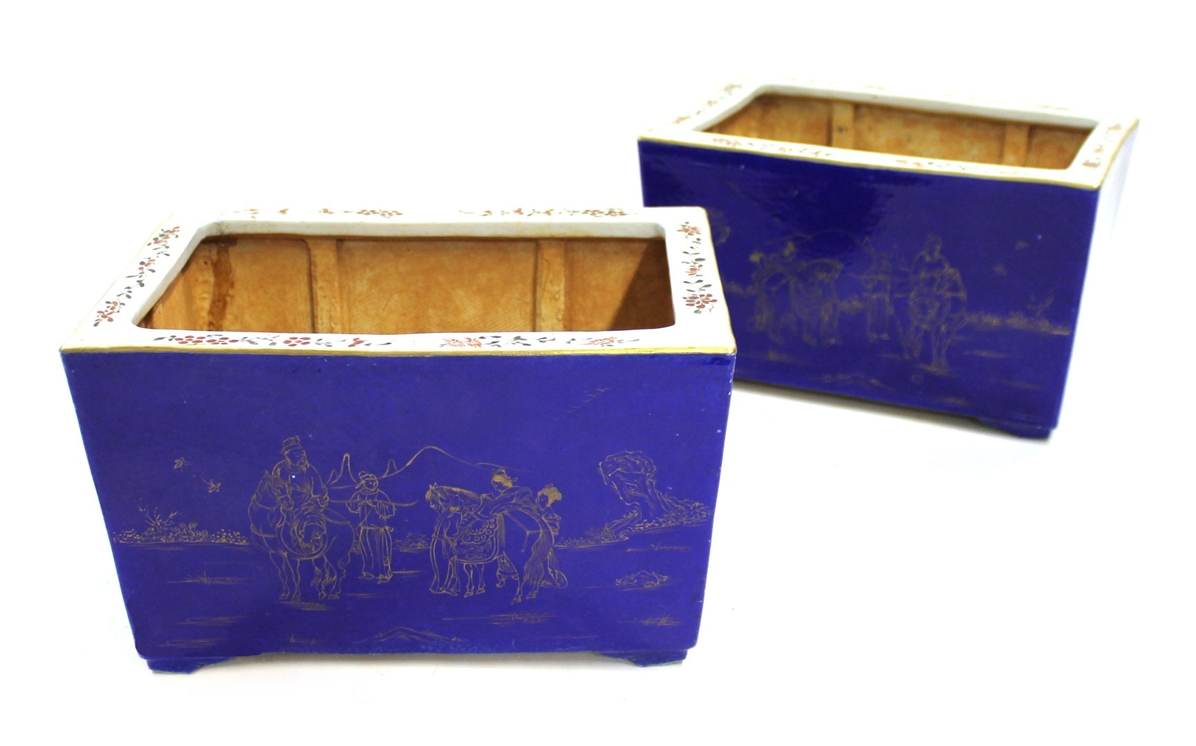 Appraisal: A pair of Chinese blue rectangular jardinieres gilt with figures