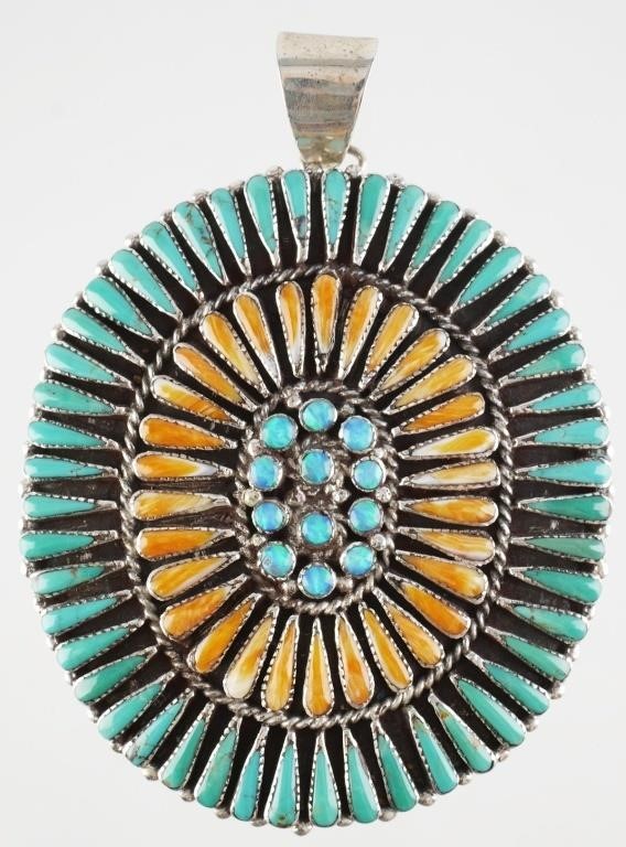 Appraisal: Native American style oval pendant with opal and turquoise cabochons