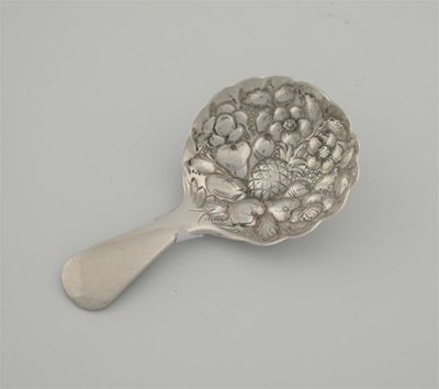 Appraisal: A George III Irish spoon the bowl embossed with a