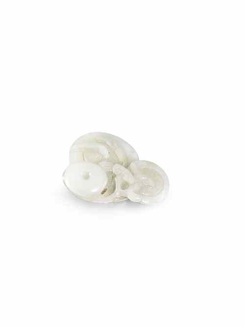 Appraisal: A Chinese whitish jade carving of mushrooms and lingzhi fungus