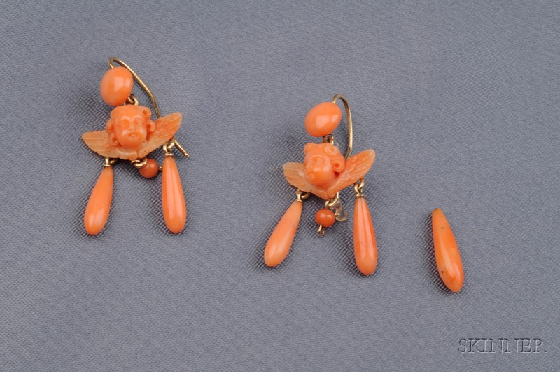 Appraisal: Antique Coral Earpendants each designed as a carved coral cherub