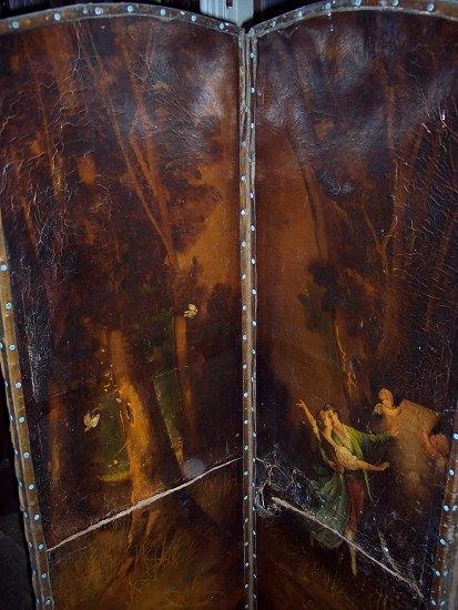 Appraisal: A three-fold screen painted on leather a lovers scene in