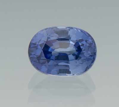 Appraisal: An Unmounted Blue Sapphire Oval faceted blue sapphire weighing ct