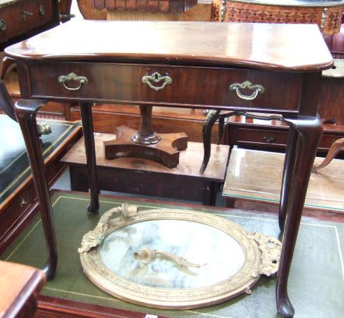 Appraisal: A late George II mahogany side table the shaped rectangular