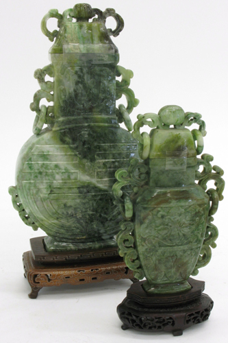 Appraisal: TWO JADEITE CHINESE SCULPTED COVERED URNS The larger in tall