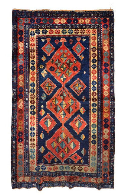 Appraisal: AN OLD ARMENIAN ERIVAN DARK BLUE GROUND RUG with a