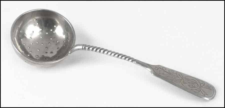 Appraisal: RUSSIAN SILVER TEA STRAINER Bearing Russian silver marks Length ''