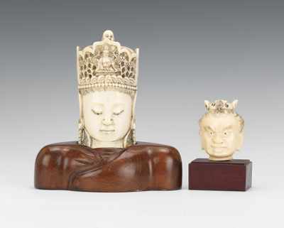 Appraisal: A Pair of Carved Ivory Heads Two carved ivory heads