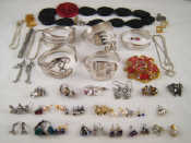 Appraisal: A quantity of costume jewellery comprising earrings necklaces cufflinks bracelets