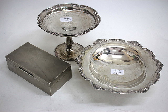 Appraisal: A SILVER TAZZA with a pierced shaped rim with marks