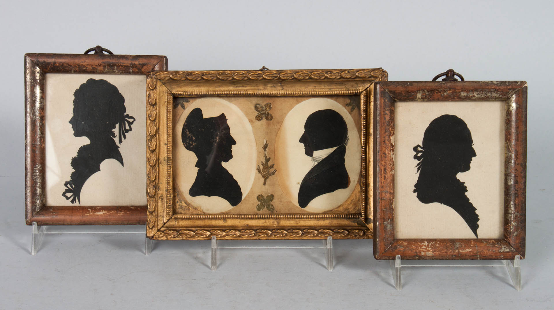 Appraisal: Two pairs of American cut-out silhouettes first quarter- th century