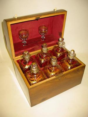 Appraisal: A MAHOGANY DECANTER BOX early th century comprising six gilded