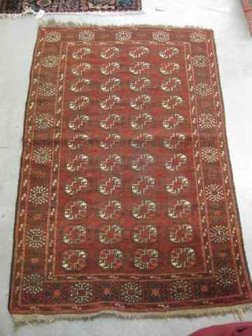 Appraisal: Belouchi Handmade Rug geometrics on deep burgundy ' '' x