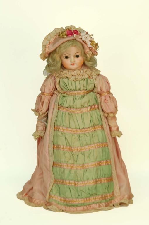 Appraisal: Composition shoulder head doll Cloth body with composition arms and