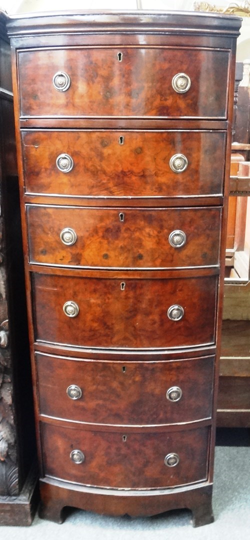 Appraisal: An early th century tall narrow walnut bowfront chest of