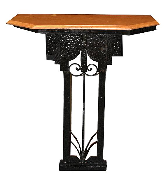 Appraisal: A pair of Art Deco style wrought iron marble topped