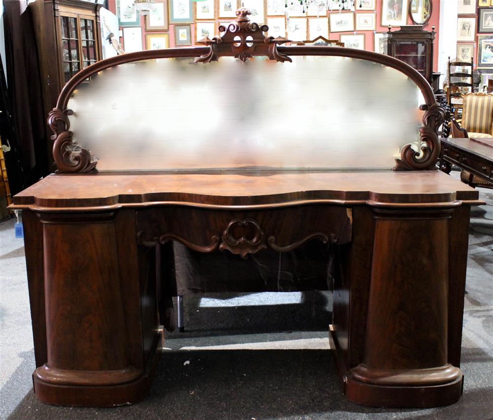 Appraisal: ROCOCO REVIVAL CARVED MAHOGANY PEDESTAL SIDEBOARD WITH ATTACHED FRAMED MIRROR