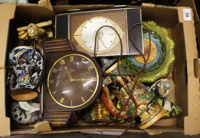 Appraisal: A collection of various pottery figures vases clocks etc