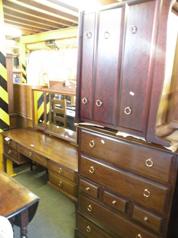 Appraisal: A Stag Minstrel dressing table a chest of three drawers