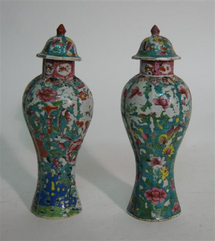 Appraisal: Pair of Chinese covered vases th th century Of lobed