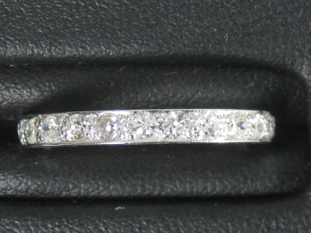 Appraisal: A Diamond Eternity Ring the circular-cut stones pave-set in platinum