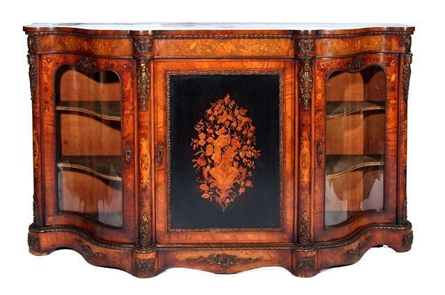 Appraisal: A VICTORIAN FIGURED WALNUT AND MARQUETRY 'CREDENZA' the central ebonised