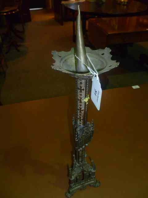 Appraisal: A SMALL GOTHIC STYLE PRICKET CANDLESTICK high and a larger