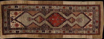 Appraisal: HAMADAN RUG The camel-colored ground worked with central rose diamond