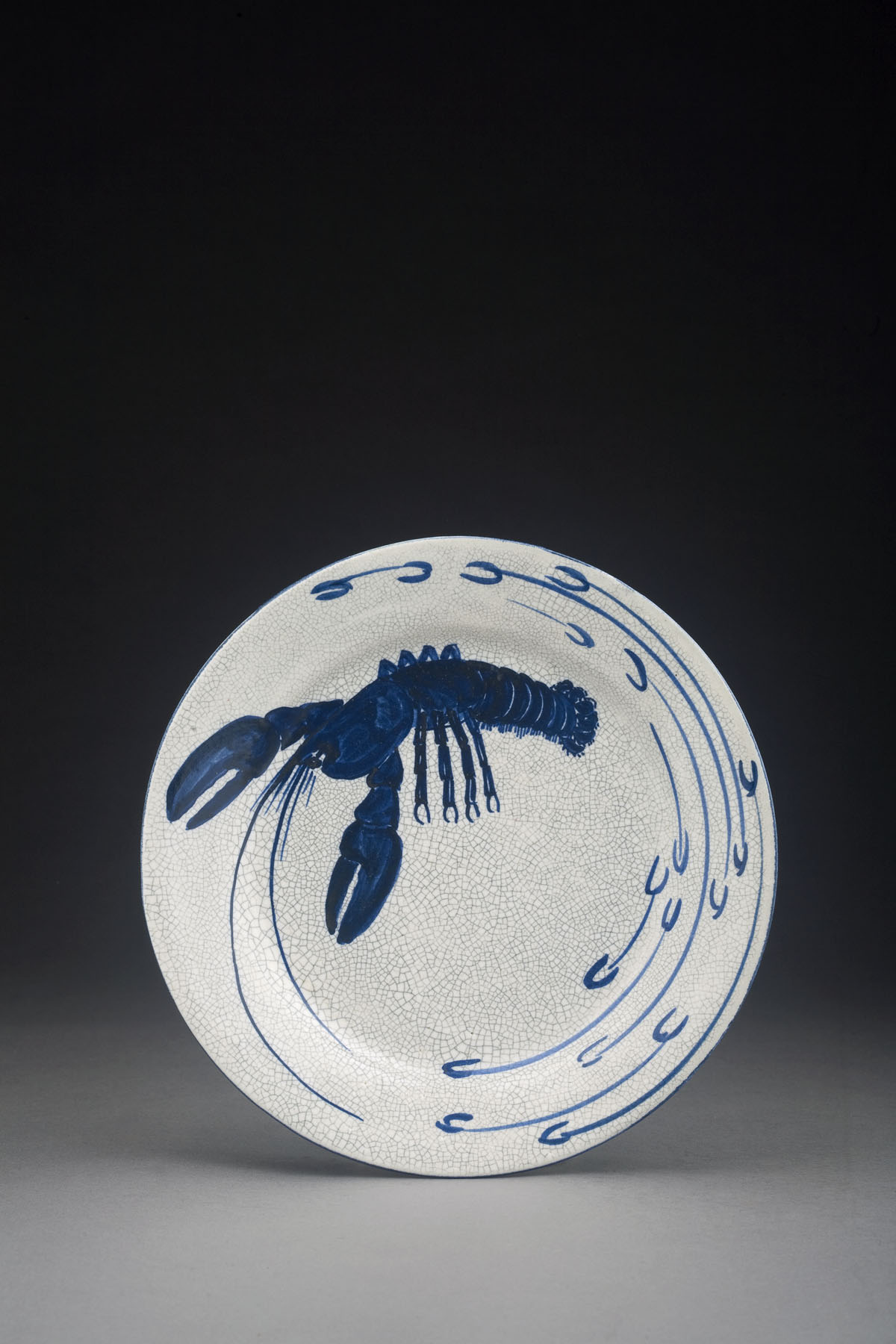 Appraisal: DEDHAM POTTERY 'LOBSTER' PATTERN PLATE Asymmetrically painted in dark blue