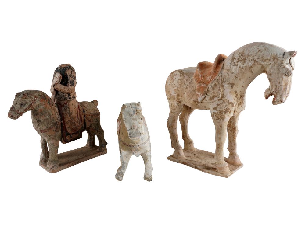 Appraisal: THREE FUNERARY HORSESincluding one figure on horseback Condition one with