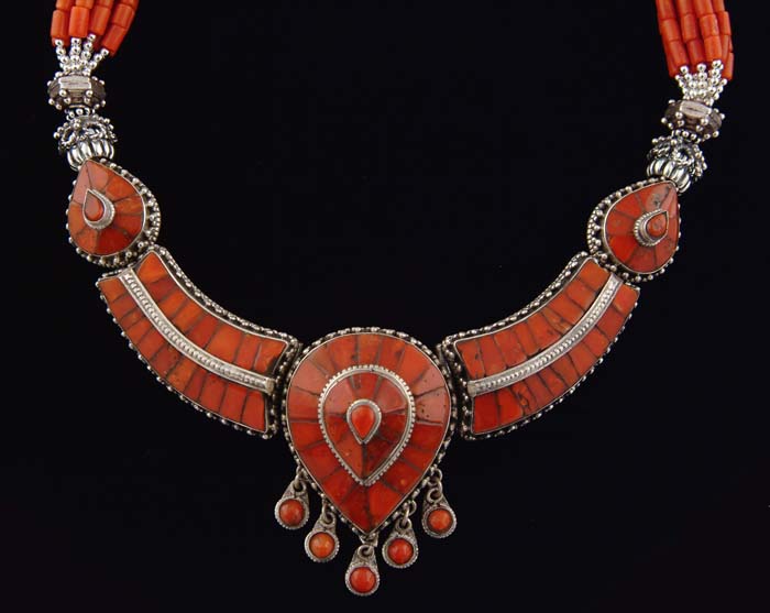 Appraisal: SILVER AND RED CORAL NECKLACE AND EARRING SUITE The elaborate