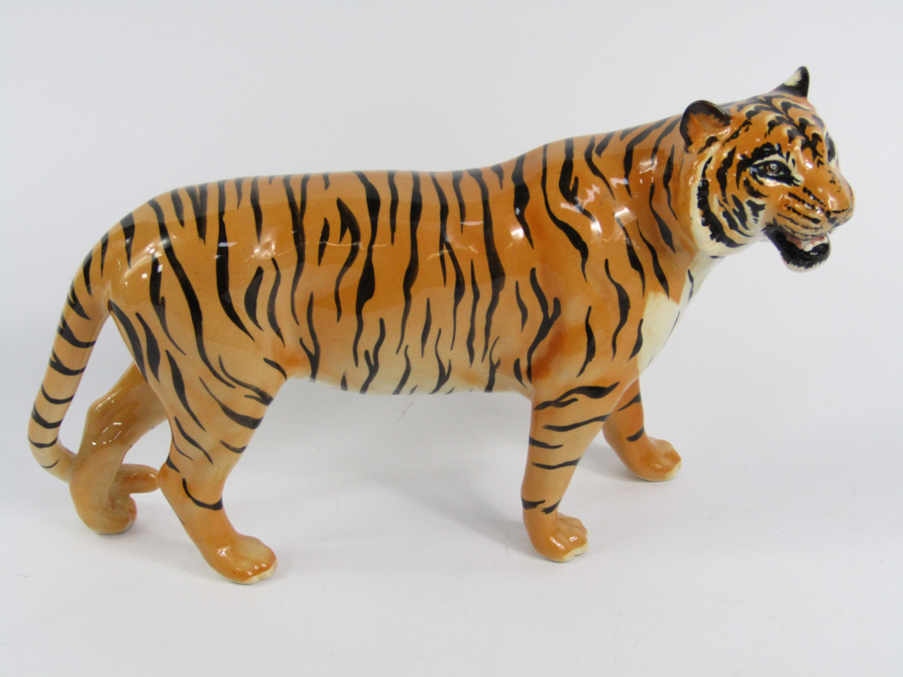 Appraisal: A Beswick pottery figure of a tiger printed mark cm