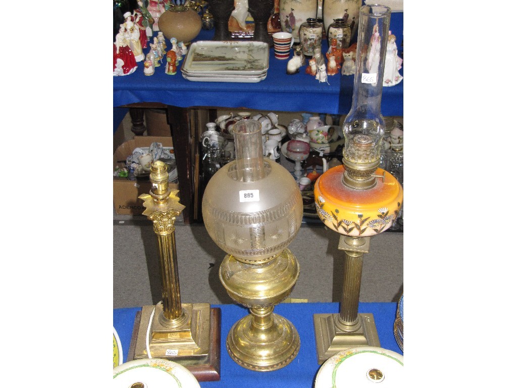 Appraisal: Brass Corinthian column lampbase and two brass paraffin lamps