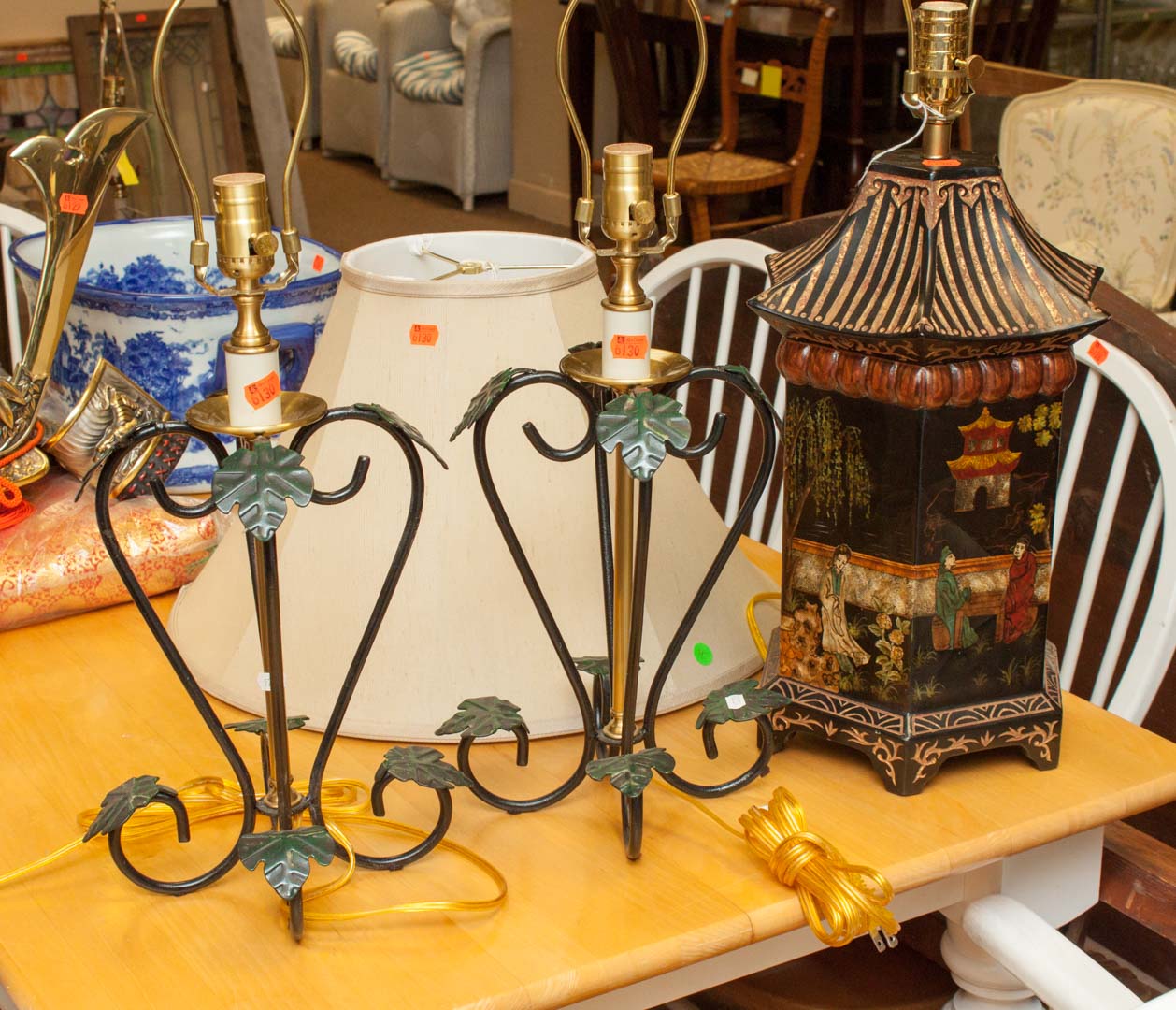 Appraisal: Three table lamps with shades and a cobalt gilt-decorated table