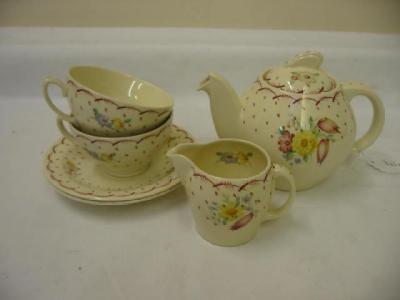 Appraisal: A SUSIE COOPER POTTERY BREAKFAST SET comprising teapot two cups