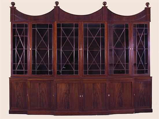 Appraisal: George III inlaid mahogany breakfront bookcase early th century triple-arch