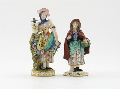 Appraisal: A Minton figure of a flower girl garlanded with large