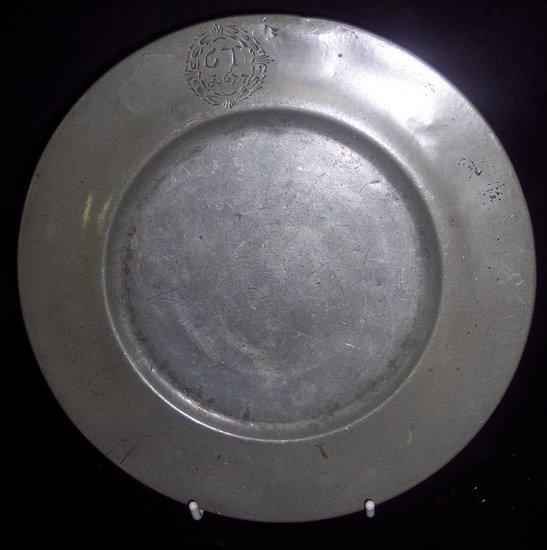 Appraisal: A late th Century circular pewter dish primitively initialled within