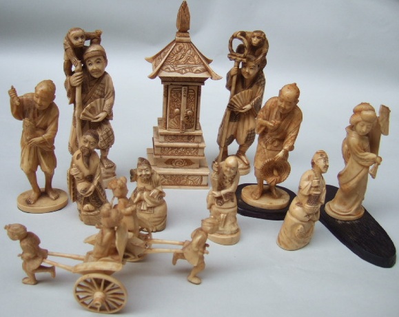 Appraisal: A group of Oriental carvings th century comprising two marine