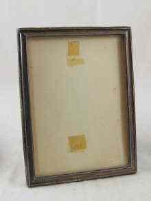 Appraisal: A silver picture frame with oak back and strut Birmingham