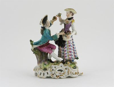 Appraisal: A Meissen group of a gentleman and a flowergirl he