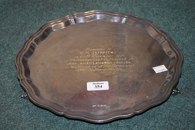 Appraisal: A SILVER SALVER of circular form with pie-crust border and